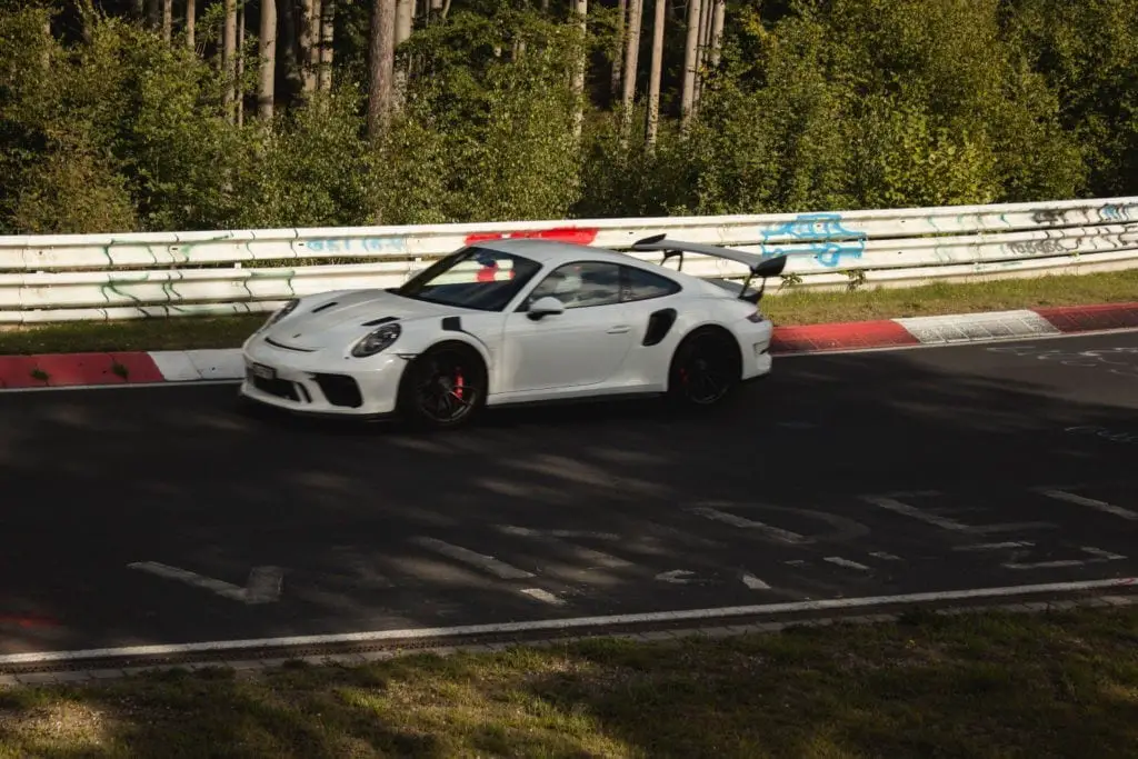 White Porsche on the Nurburgring racetrack