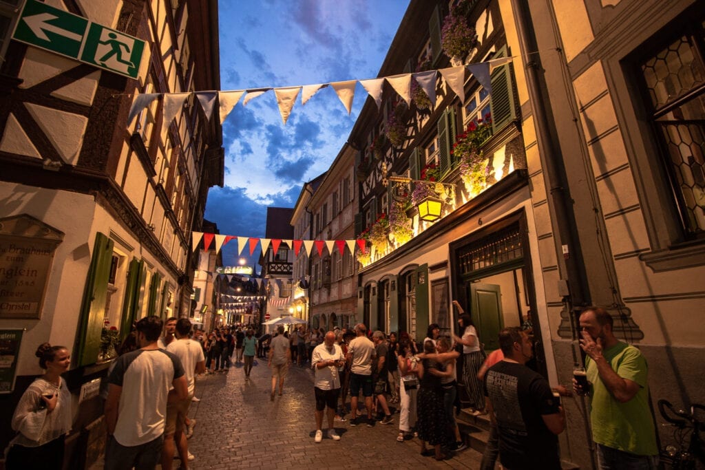 People crowding a street for bamberg Beer Festival, Bamberg