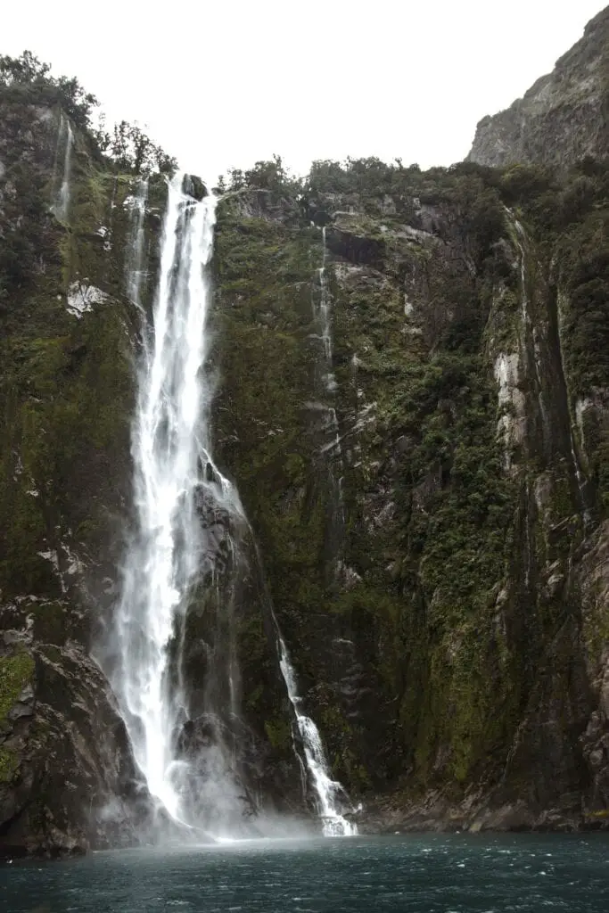 Cruise Milford Sounds - A view from below one of the incredible waterfalls