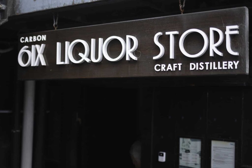 The sign outside Carbon Six Liquor Store and Craft Distillery in Auckland