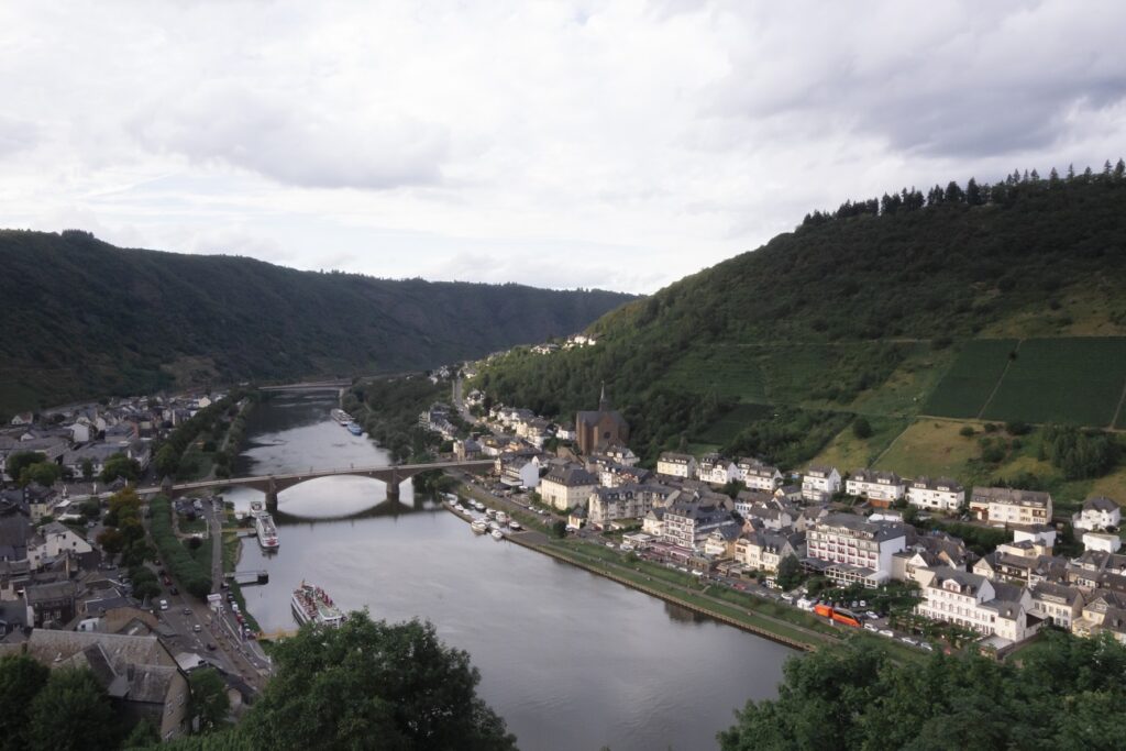 Birds eye view over Cochem,showing a large bridge stretching over the Moselle River