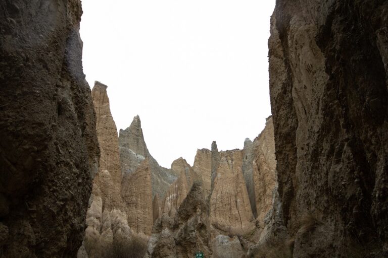 Larged jaggered sand coloured cliffs at at Omarama Clay Cliffs