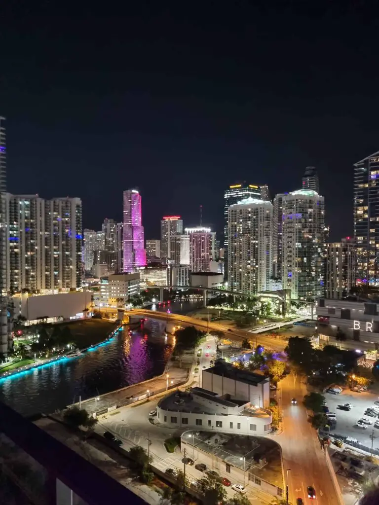 View of Miami at night from the 22nd floor of a skyrise building