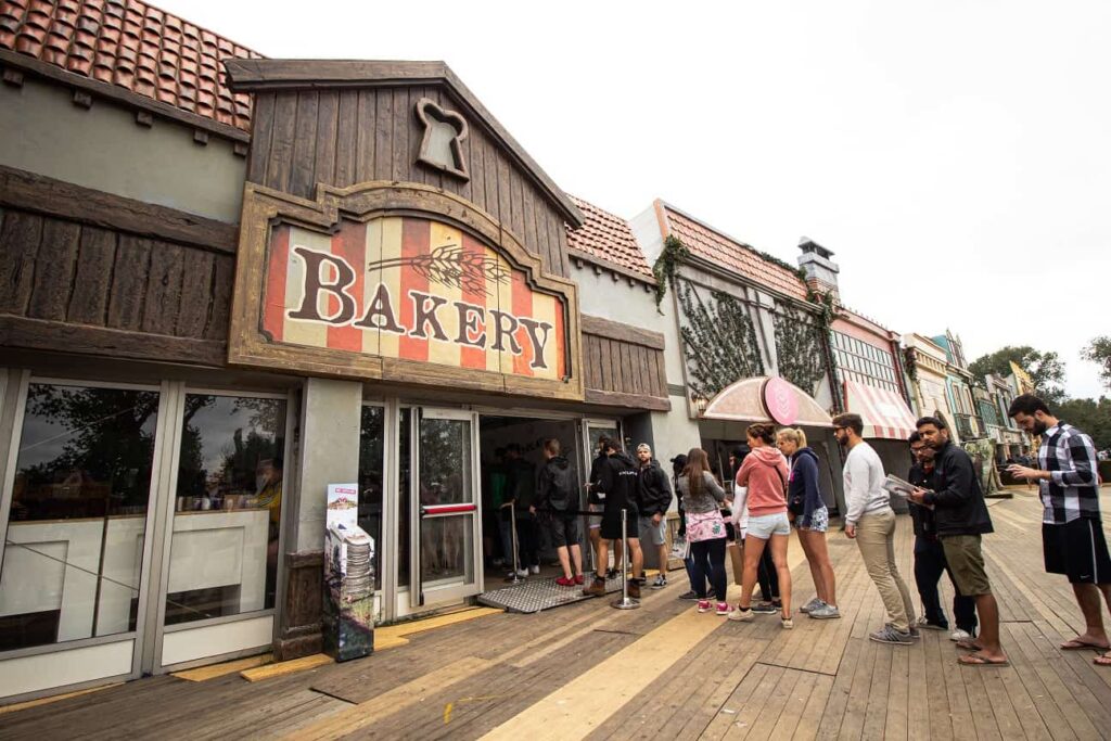 Tomorrowland Belgium: Survival Guide 2025 10 People standing in line for the bakery at Dreamville Village in Tomorrowland