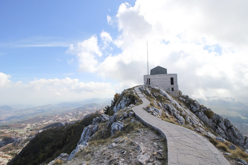 A winding pathway up to Petar II Mausoleum. The Mausoleum in Kotors national park sits on top of a high mountain with incredible views of the surrounding landscape around it.