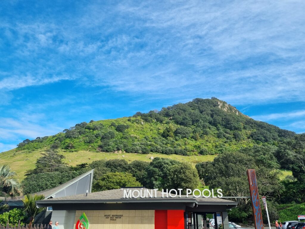 5 Fun Things to do in Mt Maunganui Photo of Mt Maunganui hot pools perched directly below the mountain as part of a Mt Maunganui travel guide