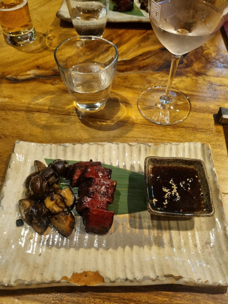 This image shows plated fresh seafood at one of the best Japanese restaurants in Auckland. Masu by Nic Watt serves delicious fine dining Japanese cuisine