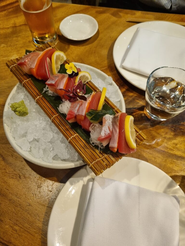 This image shows plated fresh seafood at one of the best Japanese restaurants in Auckland. Masu by Nic Watt serves delicious fine dining Japanese cuisine