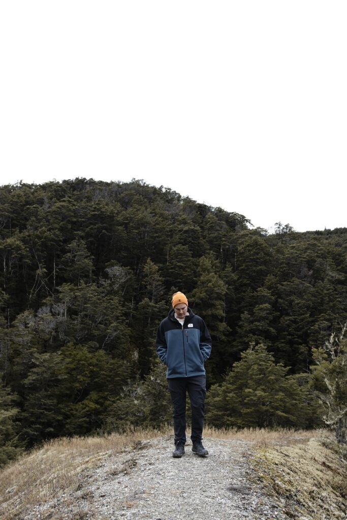 New Zealands Best Scenic Hikes: South Island Male standing on the Mt Crichton loop track.