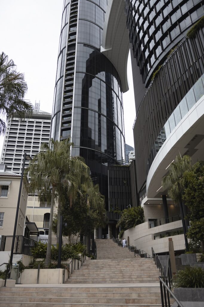 Great things to do in Brisbane: This image shows a stone stairwell leading towards The Star building in Brisbane