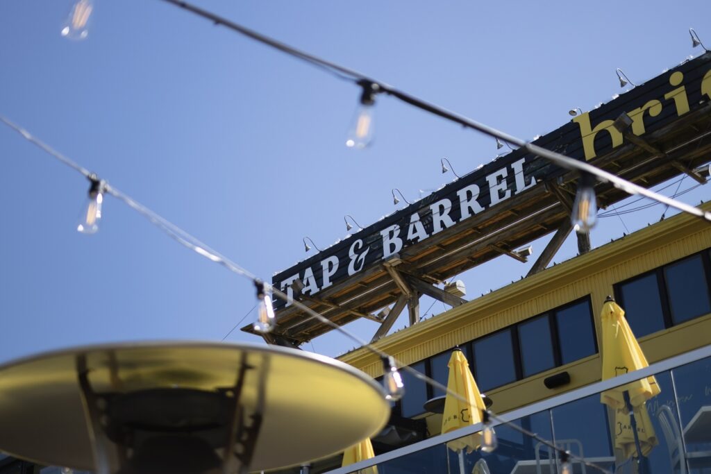Vancouver Travel Guide: A photo of the Tap and Barrel sign of a pub on Granville Island in Vancouver